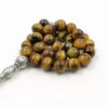 Brins de perles Musulman 2022style Yeux de tigre naturel Tasbih avec des glands de couteau en métal Perles de prière islamique 33 66 99 Bracelet en pierre spéciale Trum