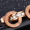 Luxury Jewelry Designer smyckesuppsättningar för kvinnor Rose Gold Color Double Rings Earings Halsband Titanium Steel Set Fasion 1133 Q4329847