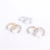 New fashion Symmetrical earrings Twist studs wholesale Gold color earrings for women