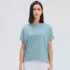 L-85 Tops de yoga Fit Slim Mujeres transpirables Correr ropa Fitness Color sólido Camiseta de gimnasia de entrenamiento de manga corta