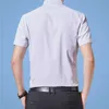 Boutique di alta qualità Camicie di lusso da uomo Colletto alla coreana Slim Fit Manica corta 100% cotone Camicia bianca casual quotidiana 4XL 5XL 210528