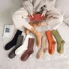 Inverno espesso senhoras lascas mulheres meias meias de algodão feminino maré simples 9 puro cor alta tubo cashmere quente meia 1 pcs y1119