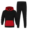 2020 Tuta da uomo Moda Abbigliamento sportivo da uomo Colore Splice Felpa con cappuccio Vetement Homme Jogging Homme Tuta Felpa con cappuccio in 2 pezzi Y0831