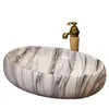 Keramik över Counter Basin Ovala europeiska marmor mönster Konstbassäng Badrum Sink Svart handfat Badrum Shampoo Sinks