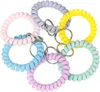 Armbandsspole Nyckelringar Armband Vår Spiral Sträcktangent Ringar Hållare Elastisk Mode Hårband Plast Telefon Rope Cord Wire KeyRings Kedjor För Gym Pool ID Badge