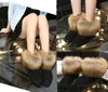 Botas de tobillo de invierno para mujer de invierno zapatos de cuñas de piel de zorro de invierno en botas femeninas de estilo australiano. XDX-072