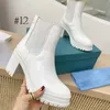 Nuevo diseñador de cuero y blanco Botines de tela de nylon negro Mujer Botines Cuero Biker Metal logo Botas Australia Botines Botas de invierno Tamaño grande 40-41-42 con caja