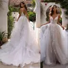 2021 Sexy Bohemian Country Beach A Line Wedding Dresses Bridal Gowns Spaghetti Straps Lace Appliques Tulle Ruffles Champagne Backless Boho Garden