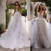 2021 Sexy Bohemian Country Beach A Line Vestidos de novia Vestidos de novia Correas de espagueti Apliques de encaje Tulle Ruffles Champagne Backless Boho Garden