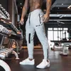 Pantaloni da uomo sportivi marca Europa e America Estate 2021 Fitness Running Training