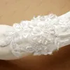 Guanti da sposa Guanti da sposa in pizzo ricamato con perline Lunghezza gomito Perle senza dita per guanti da sposa