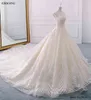 Szlachetne suknie kulowe Plus Size Sukienka Kaplica Pociąg Bride Wedding Scoop Neckline Krótkie rękawy Ves Tidos de Novia z koralikami