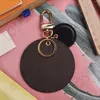 2023 Quality Fashion Woman Man Keychains fashionabla handgjorda nyckelringslegeringar Stylish Buckle Famous Designer Luxury Key Chain Hand 217w