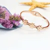 Mode 316 Rostfritt stål Rose Gold Spring Bangle Flower Armband Nickel Gratis Smycken För Kvinnor Gåva Q0717