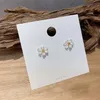 Conception coréenne bijoux de mode personnalité fleur à cinq pétales blanc petite élégante femme douce boucles d'oreilles goujon