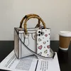 Suola dal designer nuova piccola borsa quadrata Moda rossa stessa borsa da donna portatile messenger borsa borsa borsa di bambù