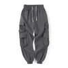 Streetwear męska boczna kieszenie Cargo Harem Spodnie 2021 Czarny Hip Hop Casual Mężczyzna Joggers Spodnie Moda Casual Spodnie Mężczyźni Ubrania X0723