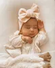 15844赤ちゃんニットヘッドバンドビッグちょう結びヘアバンドヘッドバンド幼児幼児ヘッドバンド子供広い弾性の帽子のヘッドラップ子供の髪の付属品10色