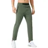 Tracksuit Kläder Designer Sport Fitness Men Byxor Kör Andningsbar Svettabsorberande Snabbtorkande Hög Elastiska Joggers Sweatpants Sport