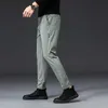 Mingyu marque automne hommes pantalons décontractés hommes pantalon homme pantalon Slim Fit travail taille élastique noir vert gris pantalon léger 28-38 211008