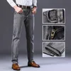Мужские джинсы растягиваются регулярно подходить для бизнес -повседневного классического стиля модные джинсовые брюки мужчина черно -голубые серые брюки 220913
