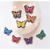 100 st/lot Original PVC Skospänne Tillbehör DIY Butterfly Shoes Dekoration Jibz för Croc Charms Armband Barn Presenter