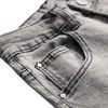 Pantalones vaqueros para hombre Homme Designer Hombres lavados rectos Pantalones de mezclilla de algodón rasgados para el diseño de parches clásico