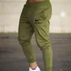 مصمم فاخر رجالي ركض الصيف Sweatpants صالات رياضية بانت اللياقة البدنية العلامة التجارية بنطلون كرة السلة الجري بدلة رياضية عالية الجودة ملابس الرجال عادية فقط كسرها السراويل