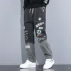 Mens Jeans Outono Letra Impressa Maré Marca Solta Dos Desenhos Animados Graffiti Calças Com Cordão Homens Streetwear