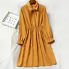 Mode Bow Robe Vintage Corduroy Femmes Bouton Pull Es Automne et Hiver Polo Col Femelle Robes 12005 210506