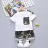 赤ちゃん男の子の服セット夏の生まれたばかりの赤ちゃんの綿のTシャツ+ショーツ2本のトラックスーツBeBe男の子の幼児かわいいジョギングスーツの衣装G1023