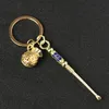 Mässing Copper Color Metal EarPick Dab Dabber rökning Tillbehör Verktyg 7 Typer Ear Pick Spoon Keychain Key Ring Shovel Wax Scoop Hosah Shisha Pipe