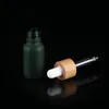 Frostglas droppflaska 10 ml 15 ml 20 ml 30 ml 50 ml med lock i bambu Eterisk oljeflaska Frostade grön