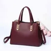 Sac pour femme en cuir véritable 2021 nouveau style coréen Msenger sac mode sac à main pour femme couleur unie cuir de vache d'âge moyen sac de mère GW52