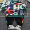 Set di vestiti per neonati per bambini in cotone primavera autunno vestito lettera stampata maglione bambini ragazzo abbigliamento sportivo casual bambino Felpa + pantaloni infantili set di due pezzi