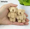 6PCS / Lot Mini Joint Ours En Peluche Jouets 6.5cm Mignon Lumière Ted Bears Pendentif Poupées Cadeaux Anniversaire Fête De Mariage Décor J00501 Y211119