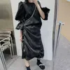 Casual svart oregelbunden kjol för kvinnor Hög midja Drawstring Ruched Slim Korean Midi Kjolar Kvinna sommar mode stil 210531