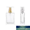 Flacon de parfum en verre transparent portable haut de gamme de 50 ml avec bouchons en or et ruban flacon vide Flacons vaporisateurs carrés transparents V3 Conception d'experts en prix d'usine