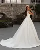 Elegant 2022 En linje bröllopsklänningar Brudklänningar Baklösa spetskristallapplikationer V Neck Boho Country Vestidos de Novia