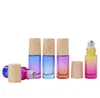 500 pçs / lote 5ml gradient cor roll-on Perfume frasco de óleo de aço essencial garrafas de esferas de metal com madeira parece plástico tampa sn4357
