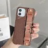 Fashion Designer Phone Cases for iphone 11 11pro 12 13 14 pro max XS XR Xsmax 7 8 plus Leather Wristband Holder Luxury Cellphone Case Cover