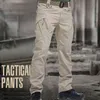 6XL City Military Tactical Broek Elastische Swat Combat Army Broek Veel zakken Waterdichte slijtvaste Casual Cargo Broek Heren 211201