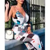 Kvinnor Jumpsuits Rompers Women Summer Beach Wide Leg Holiday Jumpsuit Ladies Evening Party Sexig blommig tryck ärmlös V-ringning