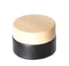 5g petit bocal en verre noir bouteilles mat avec couvercle en plastique bouchon en bois de bambou souche de cire ronde contenant cosmétique 5ml personnalisé