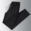 2021 Summer Mens Casual Elastic Waist pants Breathable Soft Stretch Ice Silk trousers Solid Joggers L-8XL Men Clothing NK007