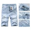 Pantalones vaqueros cortos rasgados para hombre Ropa Bermudas Pantalones cortos de algodón Denim transpirable Moda masculina Tamaño 28-40 Men's304b
