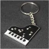 Porte-clés métal créatif piano clé entreprise simple rangée cadeau anneau personnalisé mâle et femelle pendentif