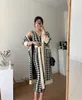 Moda coreana feminina outono inverno com decote em V quadriculado grade xadrez suéter cardigã e midi vestido tanque longo Conjunto de 2 peças