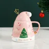 Canecas Chapéu de Santa Claus dos desenhos animados Garrafa de água cerâmica impressa com a colher da tampa Crie uma atmosfera festiva Caneca de café bonito