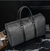 Fabrik Großhandel Herrentasche England-Stil bedruckte Männer Frauen Reisetaschen Outdoor-Fitness karierte Handtaschen große nasse und trockene Ledermode Schulterhandtasche